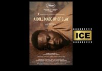 A DOLL MADE UP OF CLAY